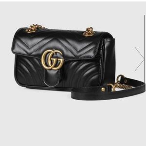 Black Gucci GG Marmont matelassé mini bag